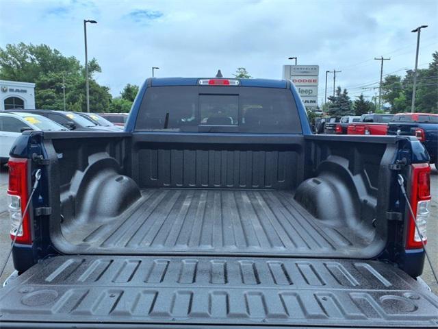 Photo of 2024 Patriot Blue Pearlcoat RAM 1500