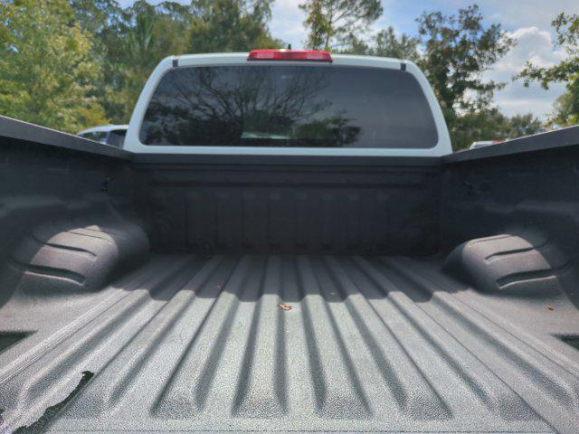 Photo of 2022 Glacier White Nissan Frontier
