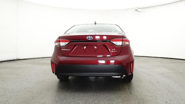 Photo of 2025 Ruby Flare Pearl Toyota Corolla Hybrid