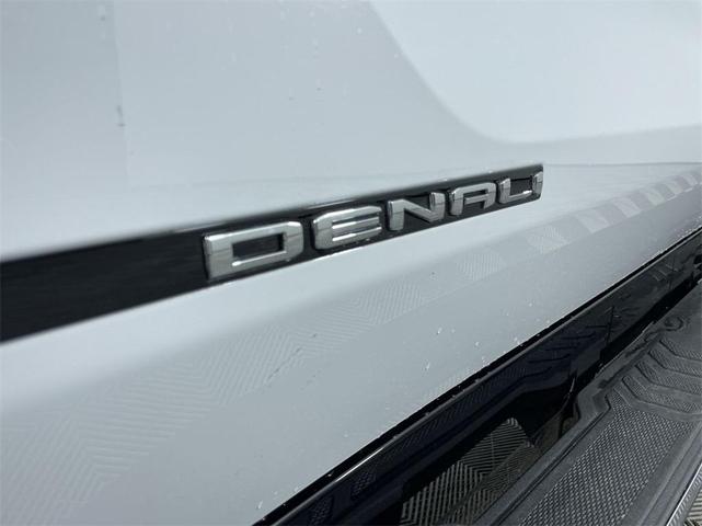 Photo of 2025 Summit White GMC Sierra EV