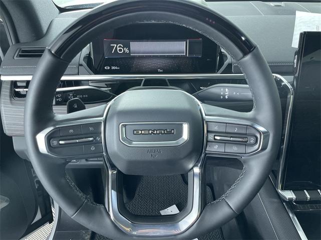 Photo of 2025 Summit White GMC Sierra EV