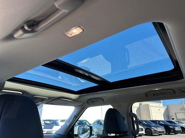 Photo of 2025 Radiant White INFINITI QX80