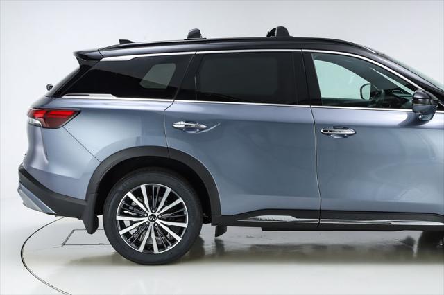 Photo of 2025 Moonbow Blue/Black Obsidian INFINITI QX60