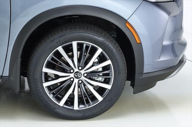 Photo of 2025 Moonbow Blue/Black Obsidian INFINITI QX60