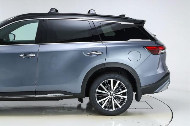 Photo of 2025 Moonbow Blue/Black Obsidian INFINITI QX60