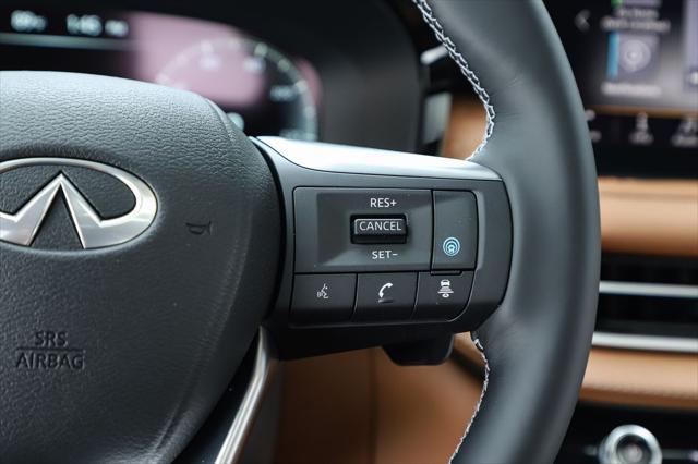 Photo of 2025 Moonbow Blue/Black Obsidian INFINITI QX60