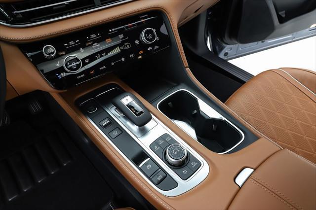 Photo of 2025 Moonbow Blue/Black Obsidian INFINITI QX60