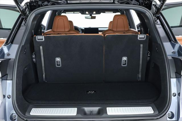 Photo of 2025 Moonbow Blue/Black Obsidian INFINITI QX60
