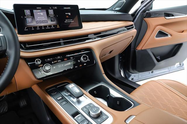 Photo of 2025 Moonbow Blue/Black Obsidian INFINITI QX60