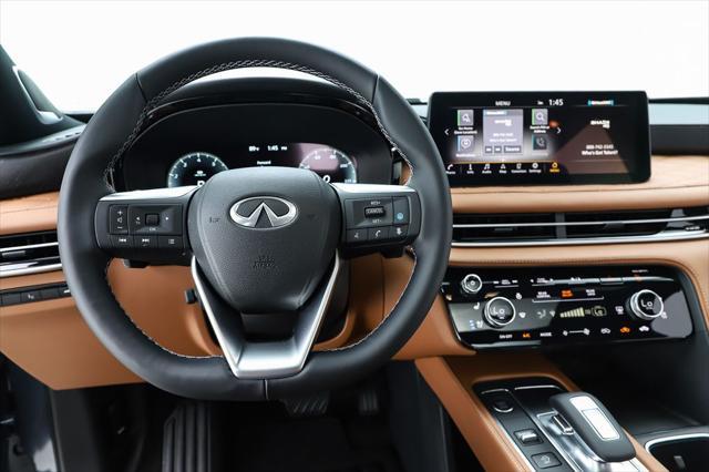 Photo of 2025 Moonbow Blue/Black Obsidian INFINITI QX60