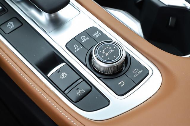 Photo of 2025 Moonbow Blue/Black Obsidian INFINITI QX60