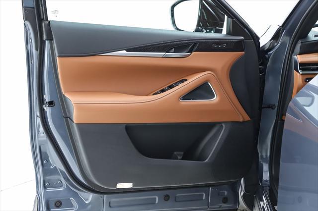 Photo of 2025 Moonbow Blue/Black Obsidian INFINITI QX60