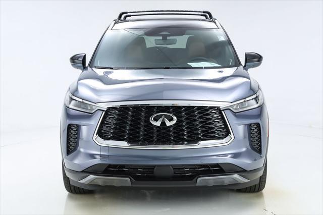 Photo of 2025 Moonbow Blue/Black Obsidian INFINITI QX60