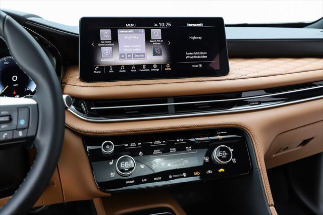 Photo of 2025 Deep Bordeaux/Black Obsidian INFINITI QX60