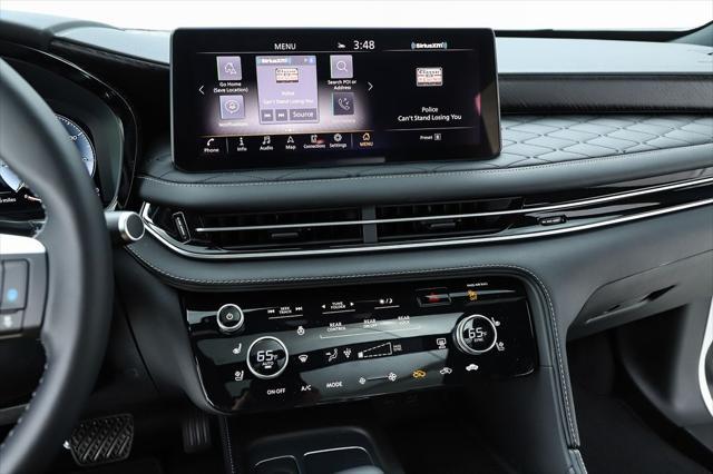 Photo of 2025 Majestic White/Black Obsidian INFINITI QX60