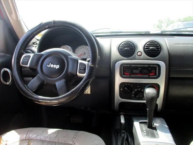 Photo of 2003 Flame Red Clearcoat Jeep Liberty