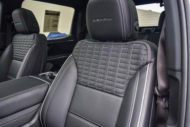 Photo of 2025 Summit White GMC Sierra EV