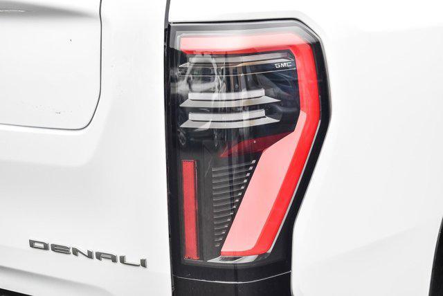 Photo of 2025 Summit White GMC Sierra EV