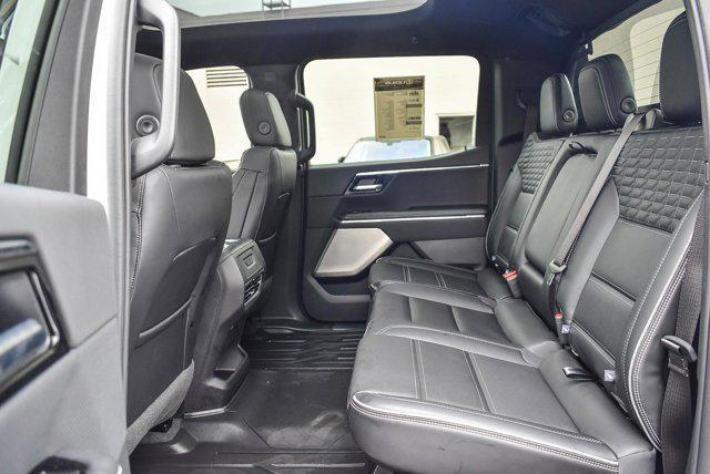 Photo of 2025 Summit White GMC Sierra EV