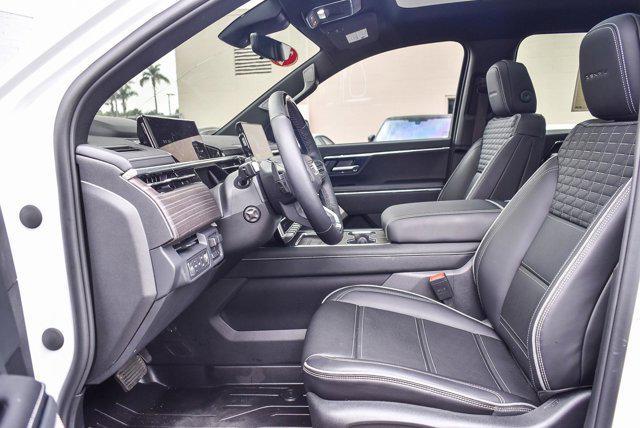 Photo of 2025 Summit White GMC Sierra EV