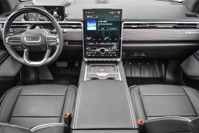 Photo of 2025 Summit White GMC Sierra EV