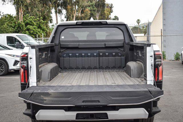 Photo of 2025 Summit White GMC Sierra EV