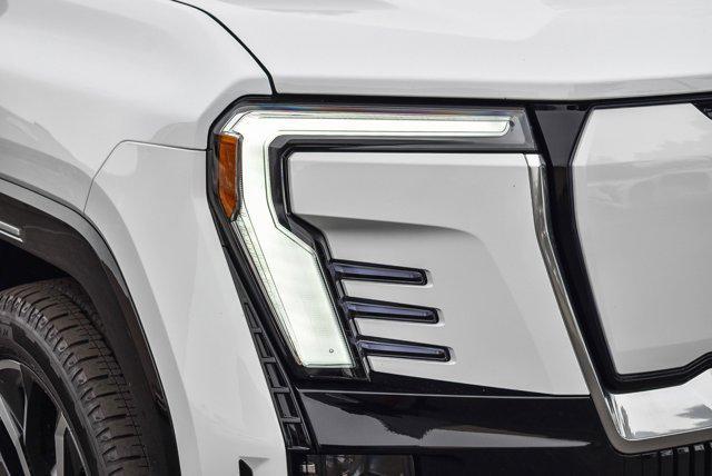 Photo of 2025 Summit White GMC Sierra EV