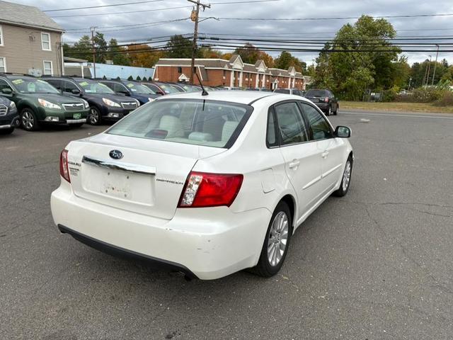 Photo of 2011 White Subaru Impreza