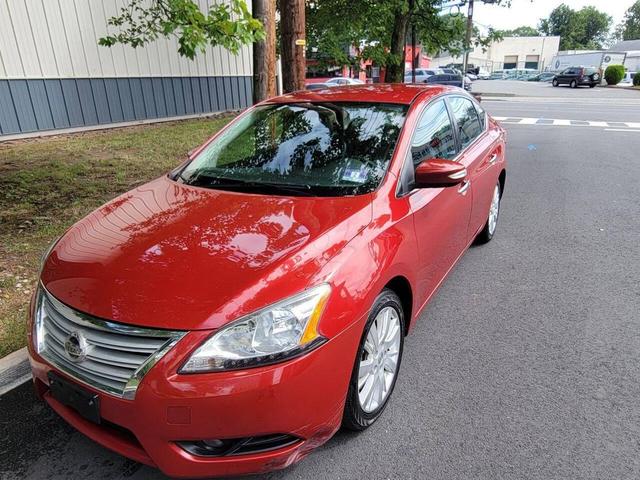 Photo of 2013 Red Brick Nissan Sentra