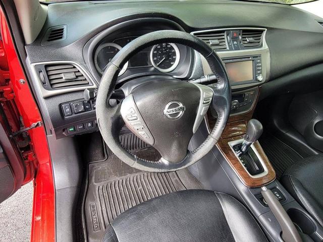 Photo of 2013 Red Brick Nissan Sentra