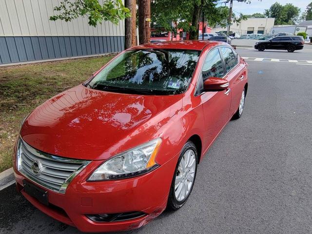 Photo of 2013 Red Brick Nissan Sentra