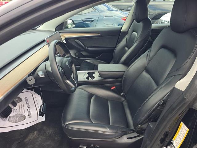 Photo of 2022 Solid Black Tesla Model 3