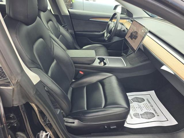 Photo of 2022 Solid Black Tesla Model 3