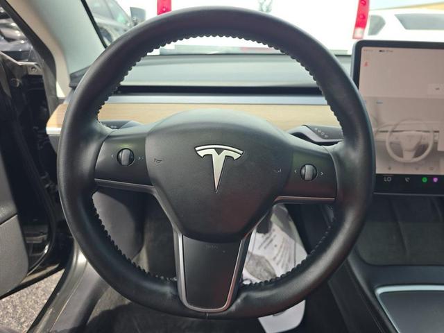 Photo of 2022 Solid Black Tesla Model 3