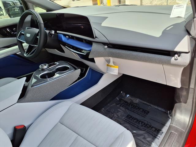 Photo of 2025 Radiant Red Tintcoat Cadillac OPTIQ