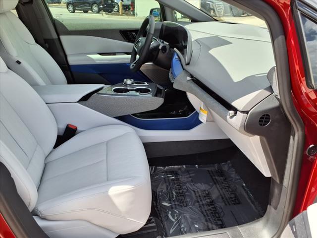 Photo of 2025 Radiant Red Tintcoat Cadillac OPTIQ