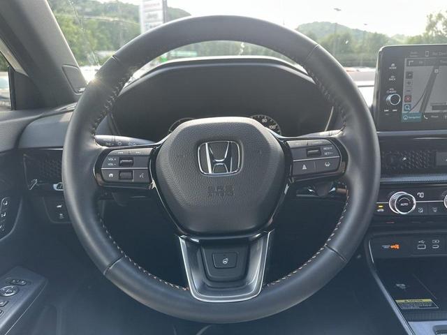 Photo of 2025 Platinum White Pearl Honda CR-V Hybrid