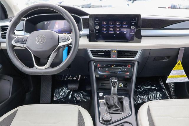 Photo of 2025 Deep Black Pearl Effect Volkswagen Taos