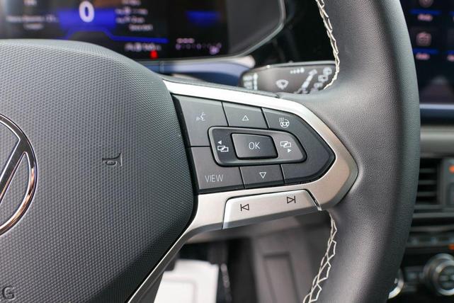 Photo of 2024 Blue Dusk Volkswagen Taos
