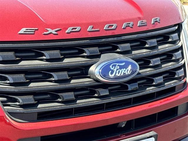 Photo of 2016 Ruby Red Metallic Ford Explorer