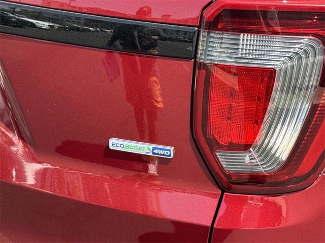 Photo of 2016 Ruby Red Metallic Ford Explorer