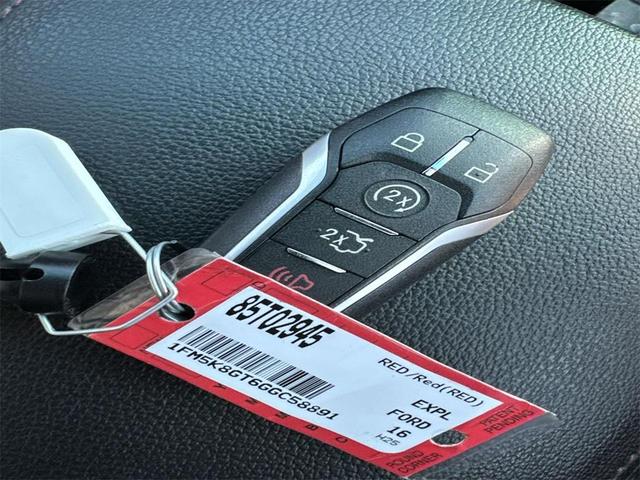 Photo of 2016 Ruby Red Metallic Ford Explorer