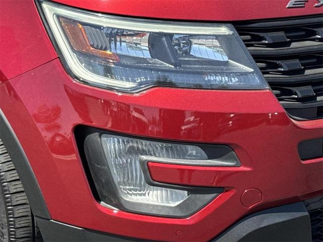 Photo of 2016 Ruby Red Metallic Ford Explorer