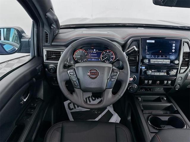 Photo of 2024 Deep Blue Pearl Nissan Titan