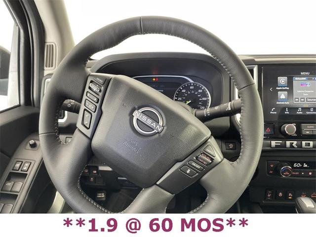 Photo of 2025 Glacier White Nissan Frontier