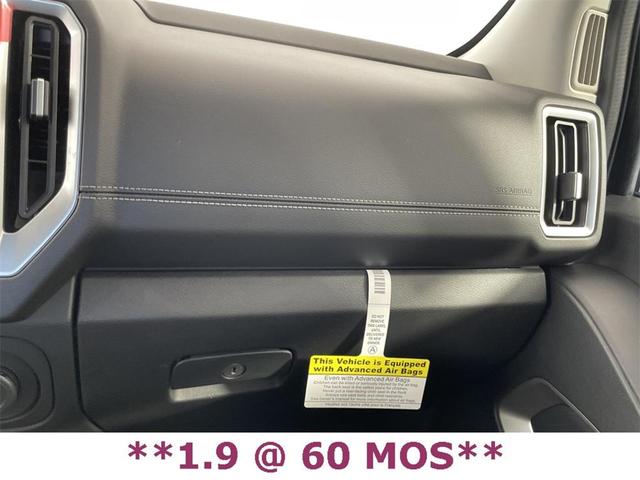 Photo of 2025 Glacier White Nissan Frontier