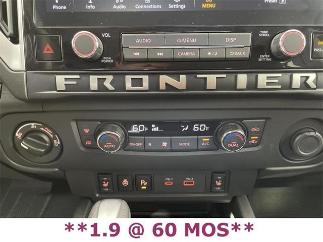 Photo of 2025 Glacier White Nissan Frontier