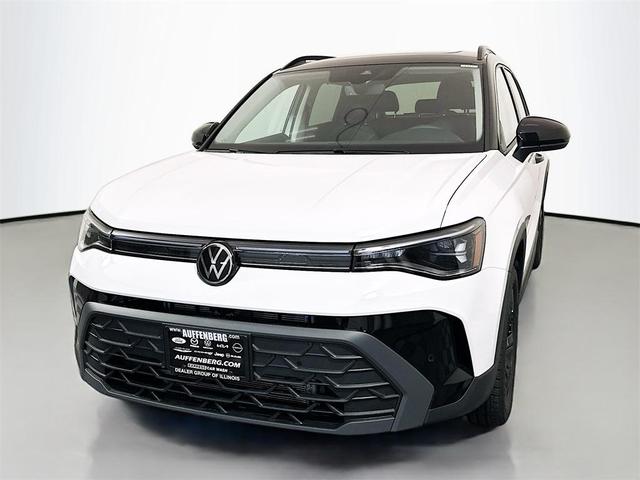 Photo of 2025 Pure White W/Black Roof Volkswagen Taos