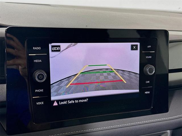 Photo of 2025 Pure White W/Black Roof Volkswagen Taos