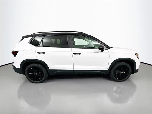 Photo of 2025 Pure White W/Black Roof Volkswagen Taos